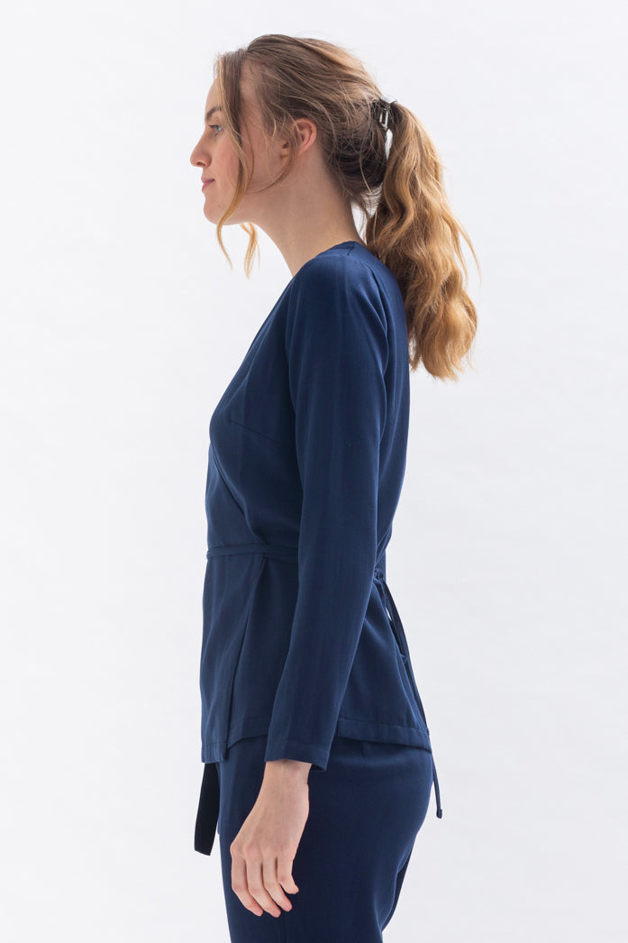 Wrap blouse "WAAN-JA" in blue made of Tencel